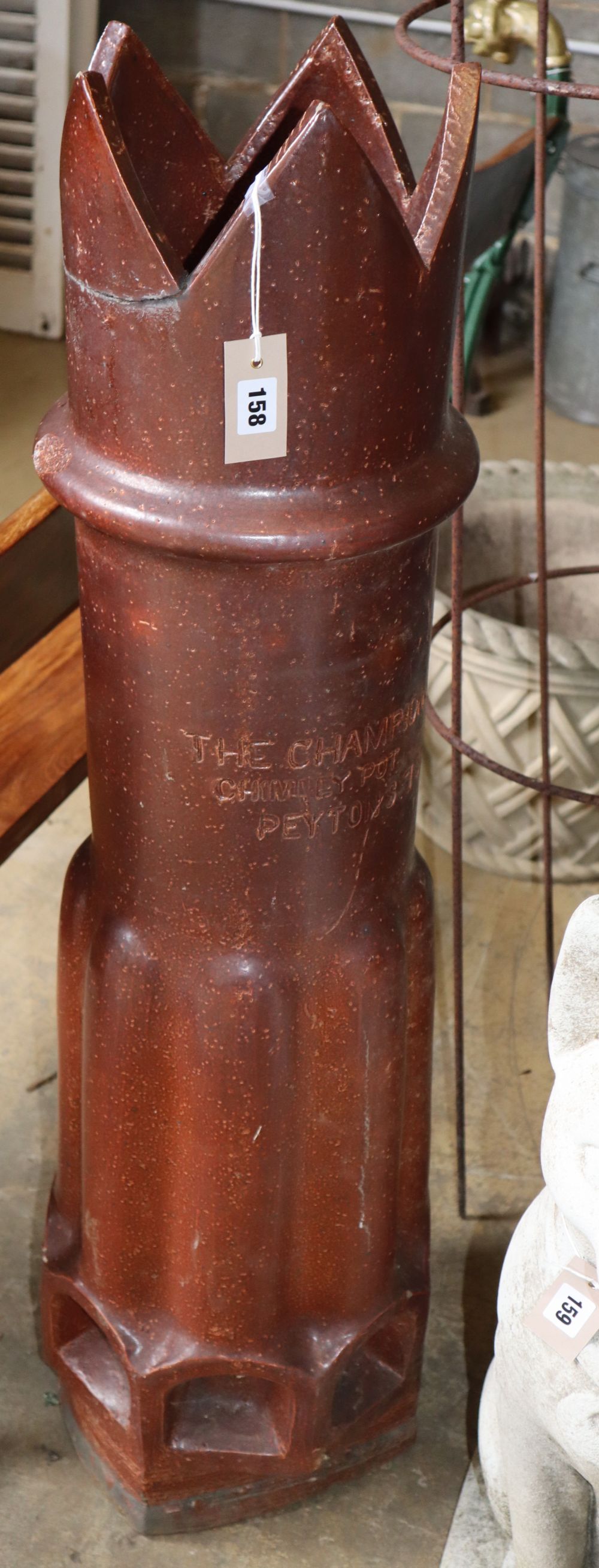 A Victorian Champion earthenware chimney pot, H.114cm